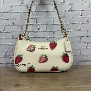 Coach White Teri Shoulder Bag
With Strawberry Print